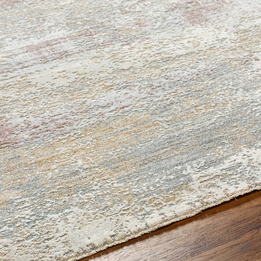 Close-up of the Hanne Thick Luxe Rug showing its textured, multi brown, gray, and cream contemporary design. Texture