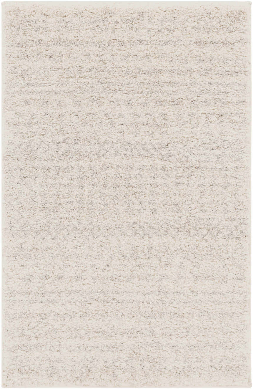Close-up of the Harpursville Area Rug. Light gray and brown textured rug, machine woven polypropylene. Design-Rectangle-23