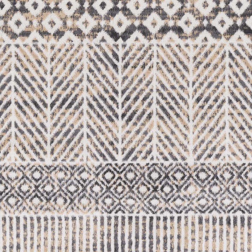 Close-up of Hassocks Area Rug featuring a geometric pattern in charcoal, cream, light gray, and tan. Swatch