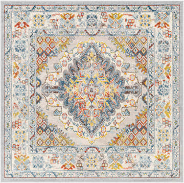 Close-up of the Haymond Area Rug. Bohemian style rug with brick red, charcoal, cream, and blue oriental pattern. Design-Square-65