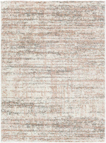 Close-up of the plush Hammond Dusty Pink Rug. Cream, pink, and gray hues create a soft, textured shag rug. Design-Rectangle-5373