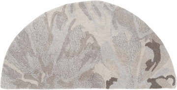 Close-up of the Ilfeld Athena Gray Floral Wool Rug, hearth shape. Features charcoal, gray, and taupe floral pattern. Hand-tufted texture. Design-Hearth