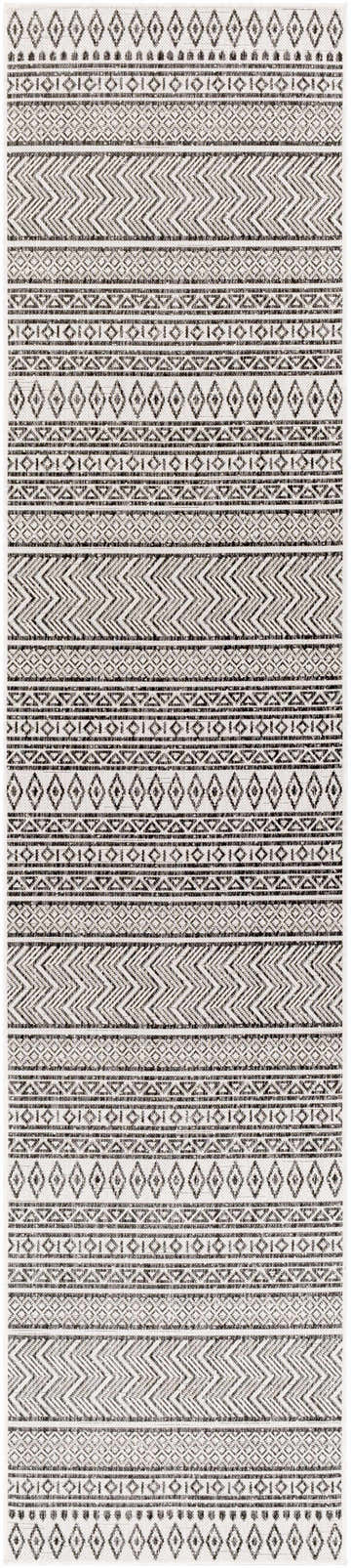 Close-up of the Imboden Black&White Outdoor Rug. Features a bohemian-inspired geometric pattern in black and white. Design-Runner-2712