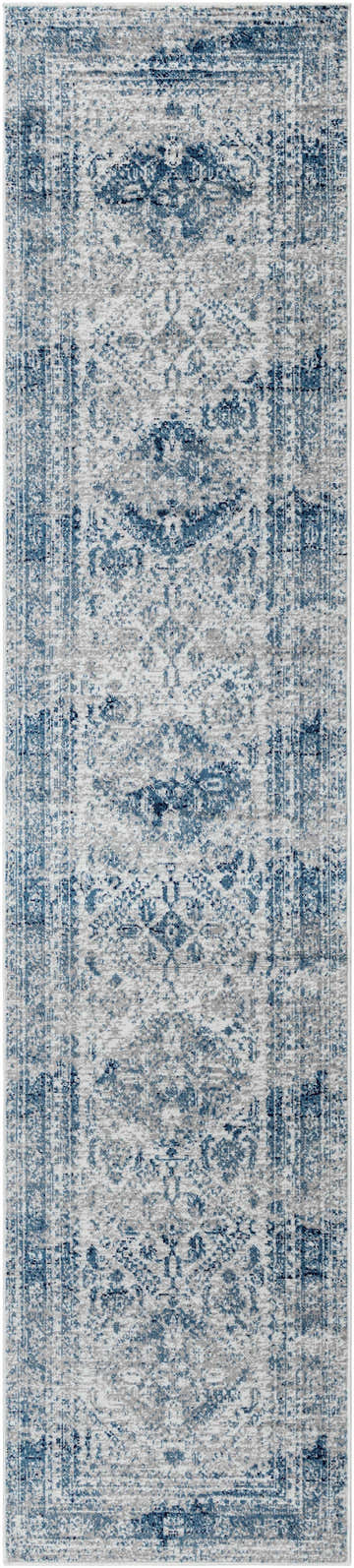 Close-up of the Inkom Area Rug, showcasing its blue, light gray, and white traditional pattern. Design-Runner-2712