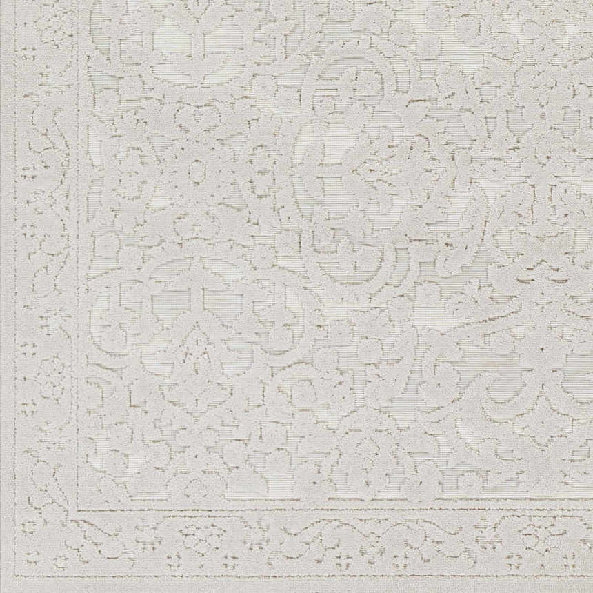 Close up of the beige Innaloo 3D Outdoor Area Rug, showcasing its subtle floral pattern and textured weave. Swatch