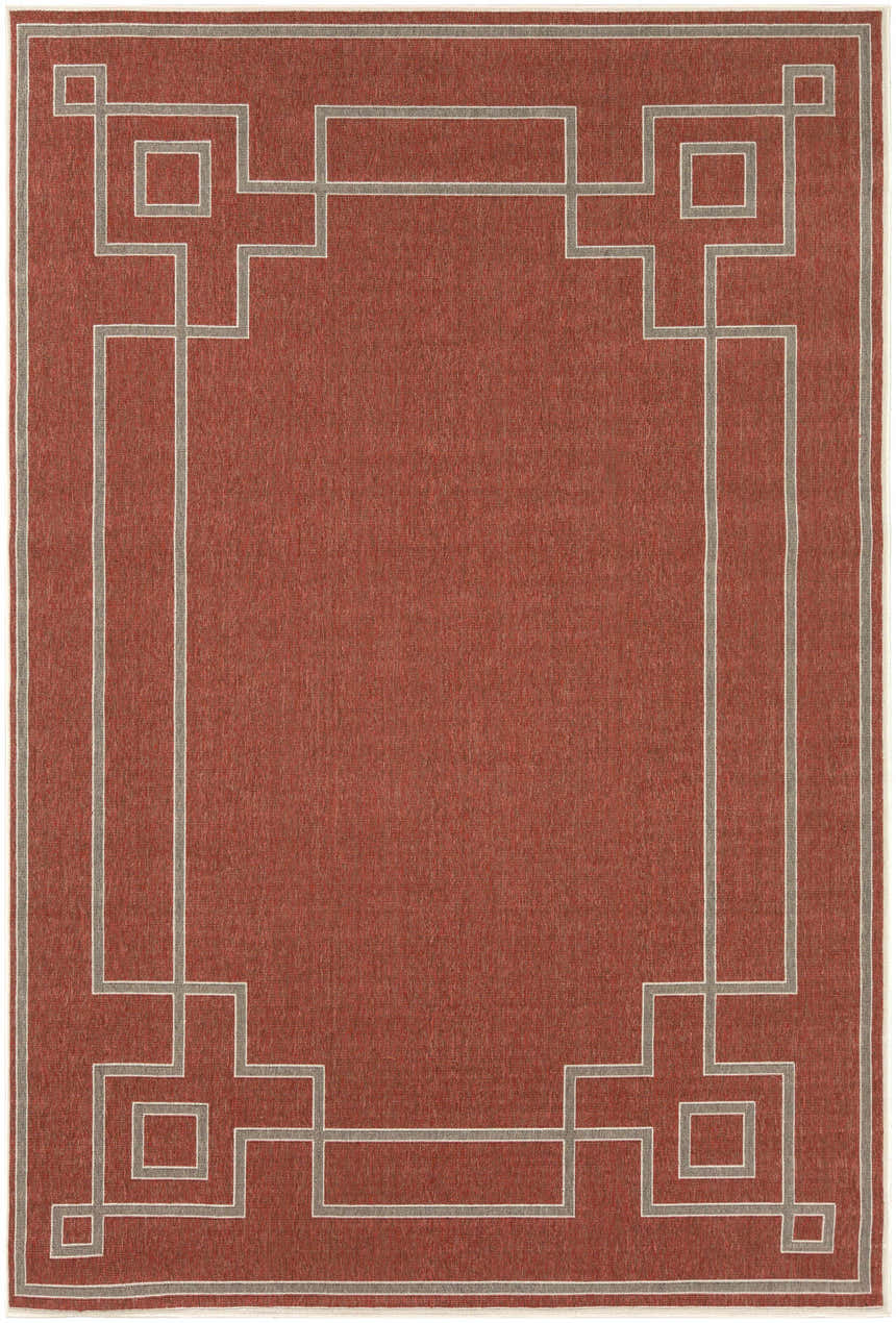 Close-up of the Jarrell Area Rug; brick red olefin rug with a light beige and light brown geometric border. Design-Rectangle-76109