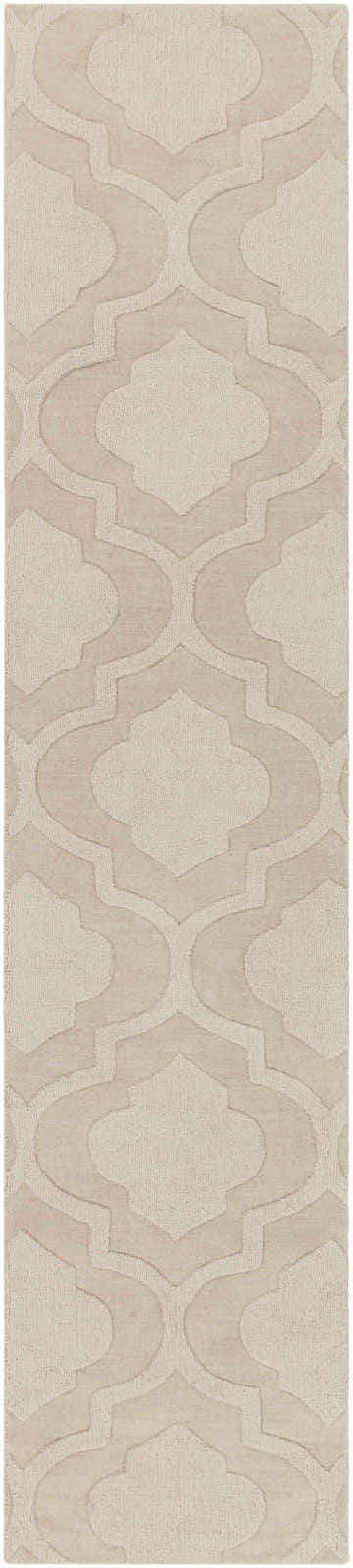 Close-up of the tan Kake Carpet, a hand-loomed wool rug with a contemporary geometric pattern. Neutral tones. Design-Runner-310