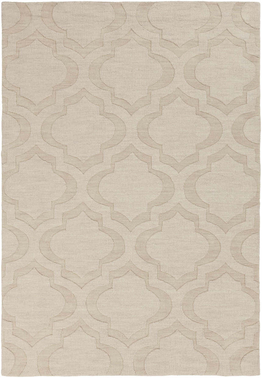 Close-up of the Kake Carpet. Tan wool rug with a contemporary, geometric quatrefoil pattern. Hand-loomed texture. Design-Rectangle-576