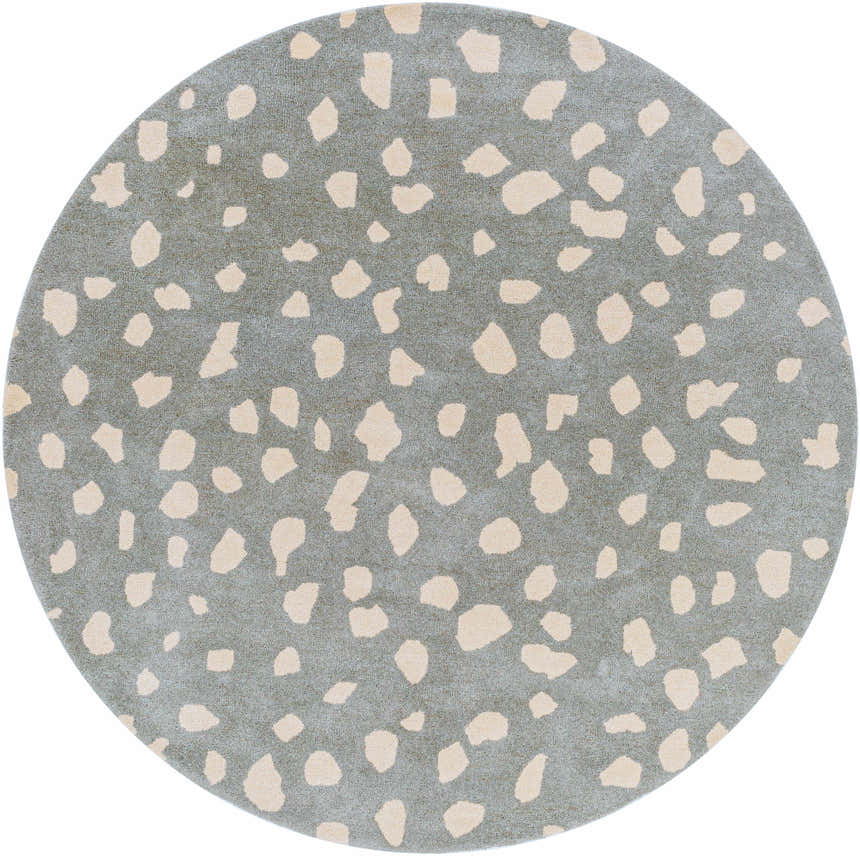 Close-up of a round Kaweah Dalmatian Print Carpet. Features a gray background with cream-colored abstract spots. Hand-tufted texture. Design-Round-6
