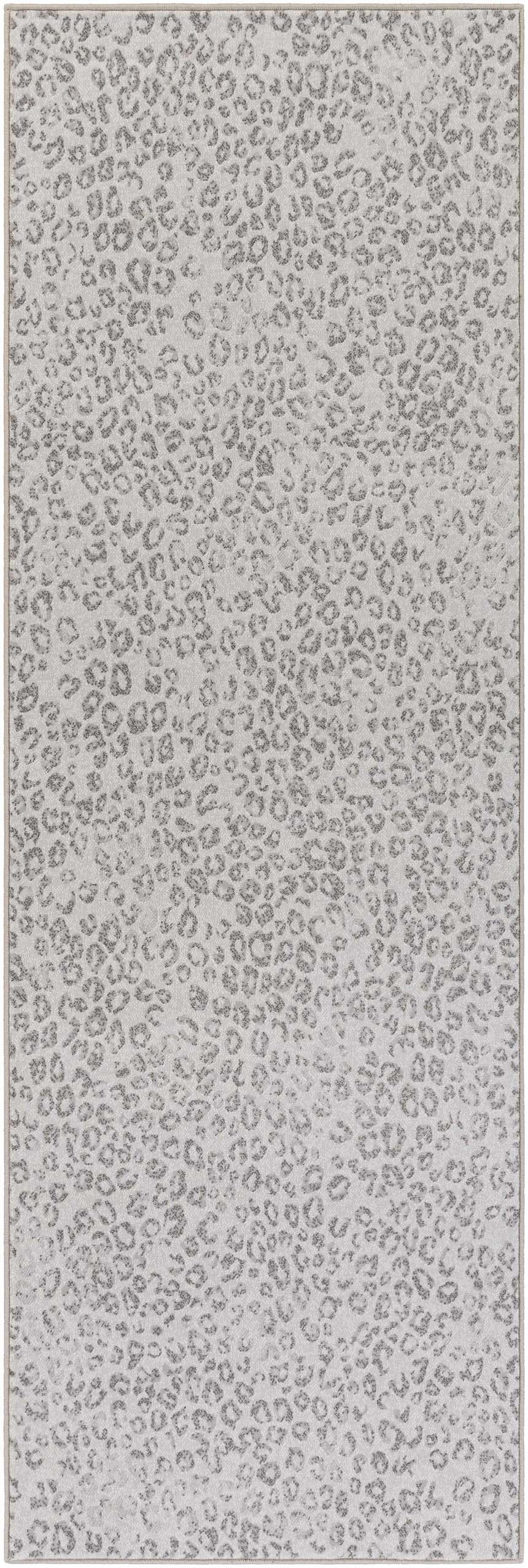 Close-up of the Keenes Leopard Print Area Rug; charcoal spots on a cream and light gray polypropylene rug. Design-Runner-27710