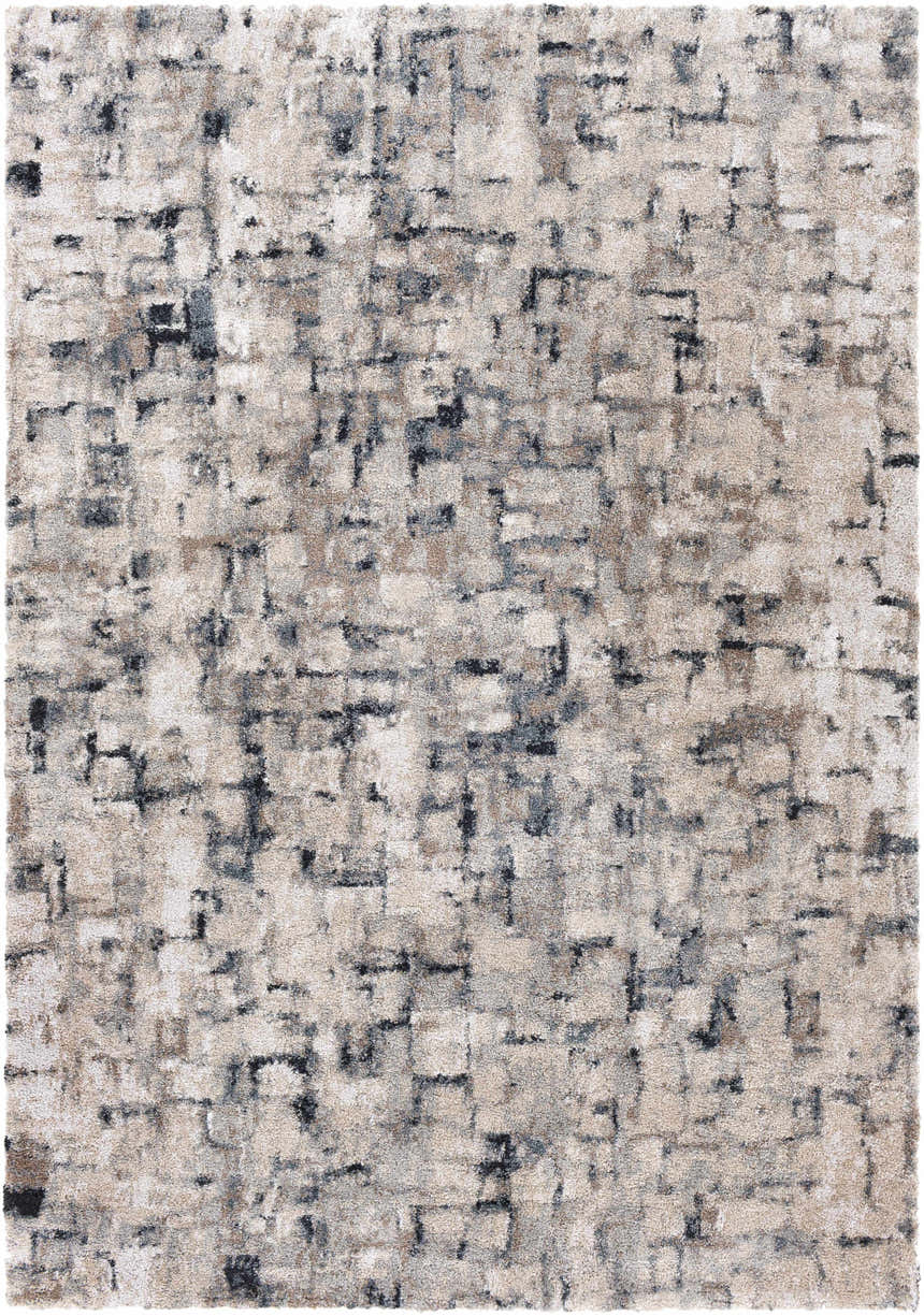 Close-up of the contemporary Kilbirnie Area Rug; a machine-woven design in black, cream, gray, and beige polypropylene. Design-Rectangle-537