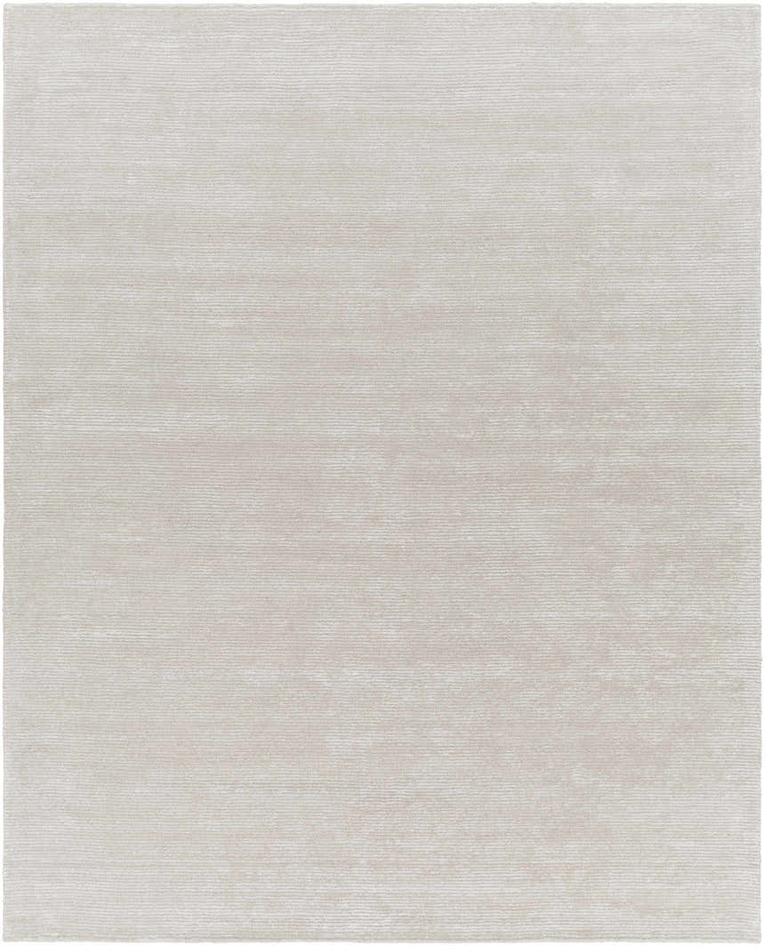 Close-up of the light gray Keller Area Rug. Hand-tufted wool and viscose rug with a subtle striped pattern. Design-Rectangle-810