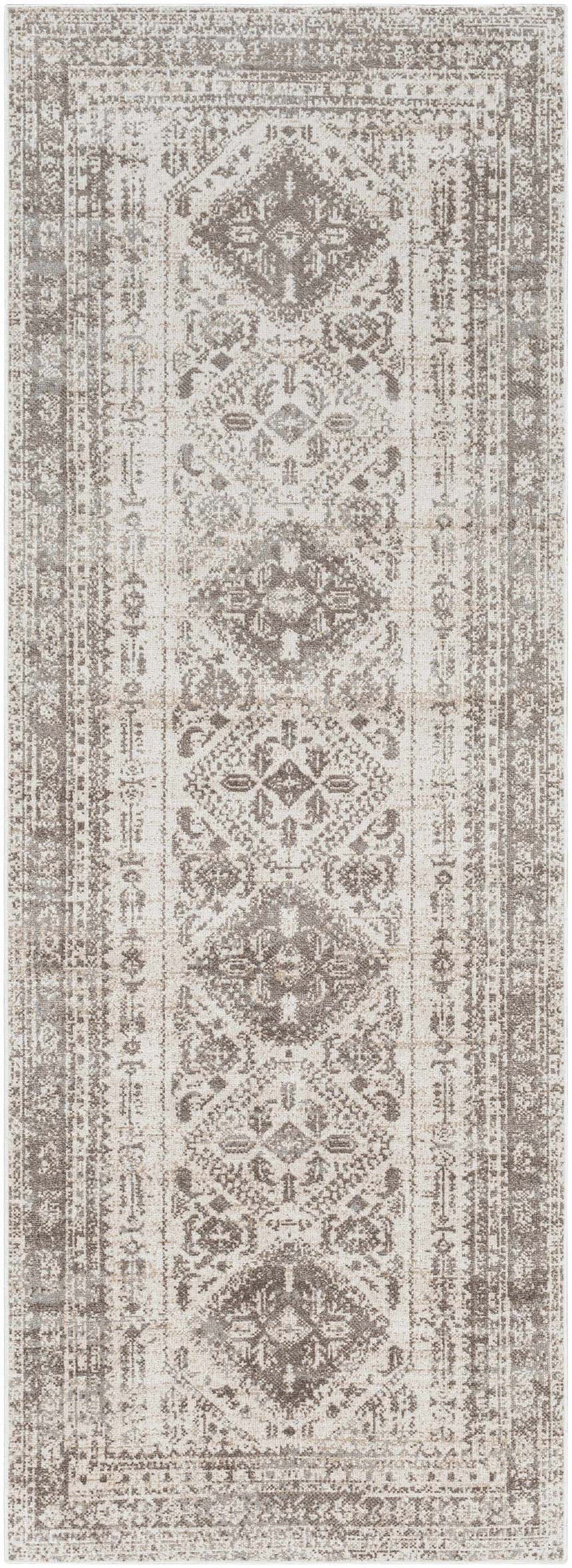 Close-up of Ladybrand Washable Area Rug with traditional brown, beige, and gray oriental pattern. Machine woven polyester rug. Design-Runner-2773
