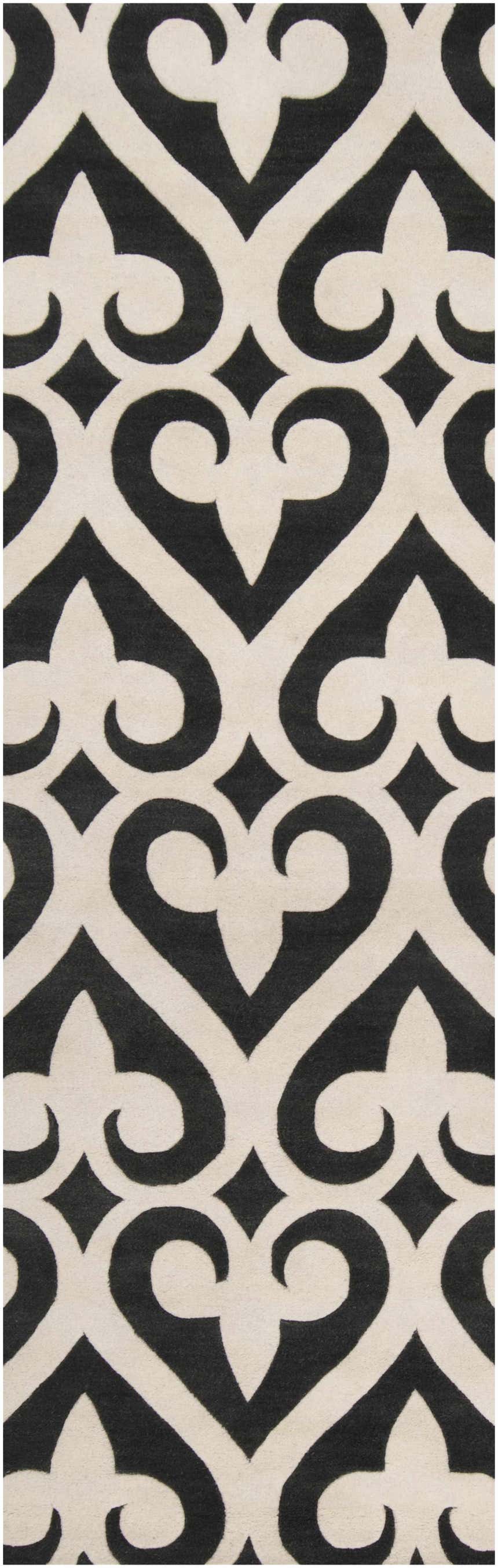 Close-up of the Landa Area Rug. Black, cream, contemporary design with a hand-tufted texture. 100% NZ Wool. Design-Runner-268