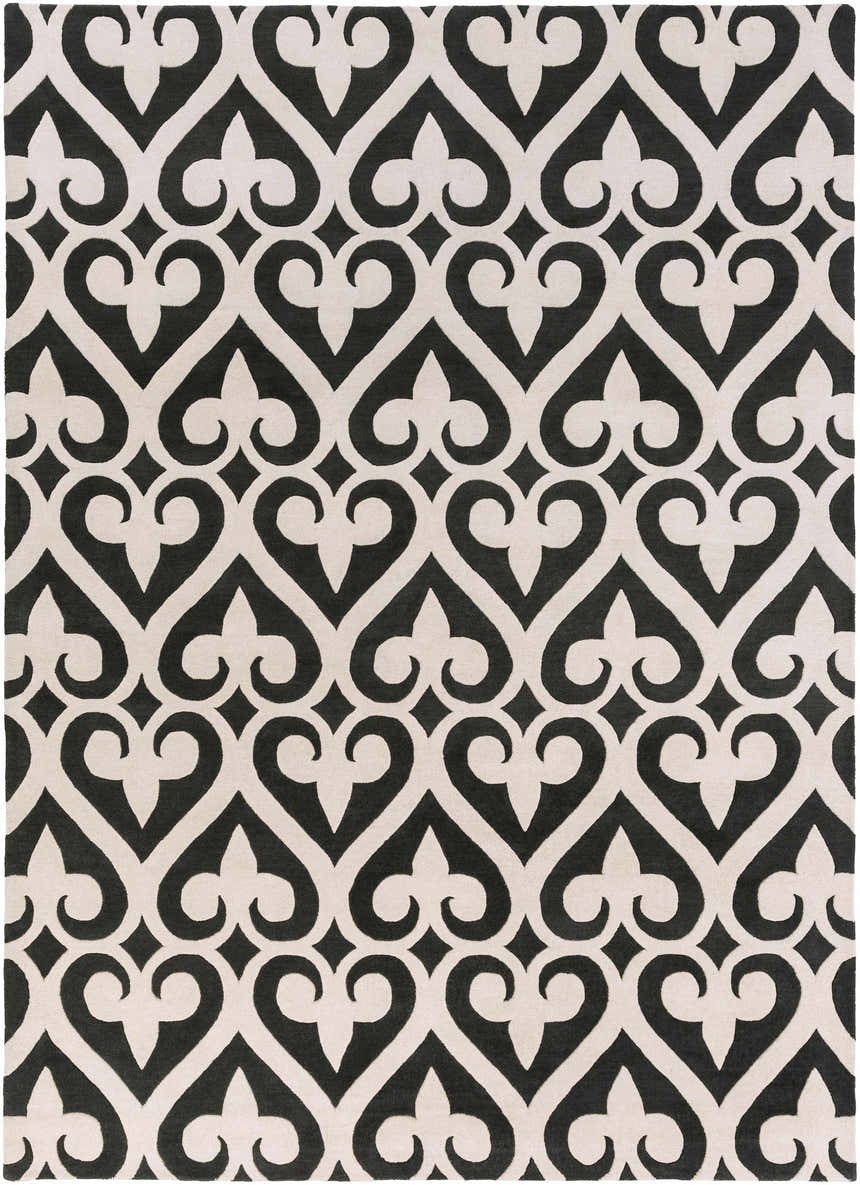 Close-up of the Landa Area Rug: a hand-tufted, rectangular rug with a black and cream geometric, heart-like pattern. Design-Rectangle-811