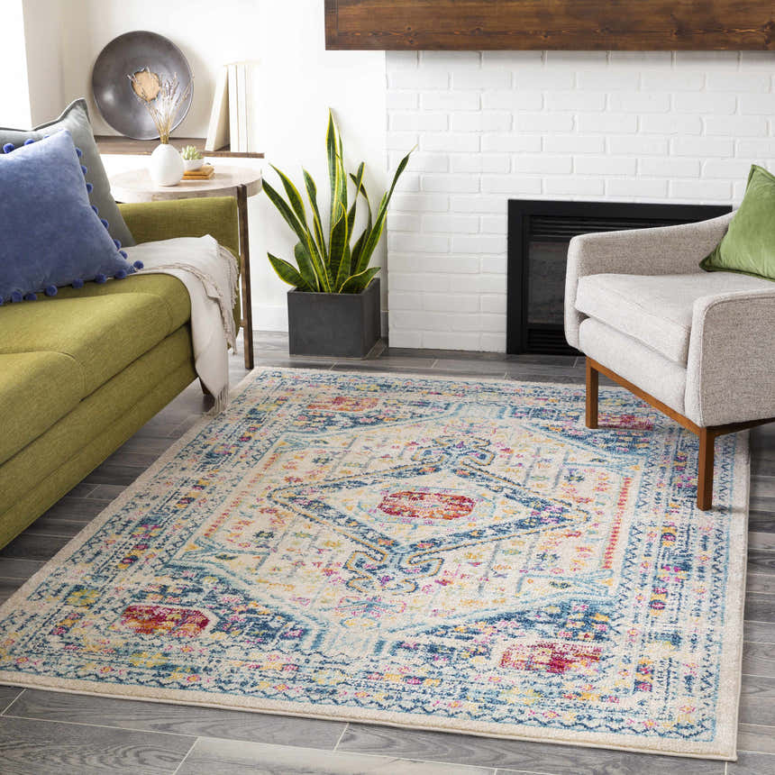 Living room scene with Leslie Area Rug, aqua, orange, and gray tones. Farmhouse style. Roomscene-Rectangle