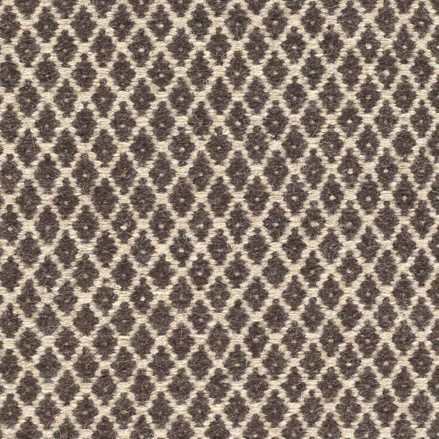 Close-up of Lingo Brown Trellis Flatweave Rug. Dark brown trellis pattern on oatmeal wool. Hand woven texture. Texture