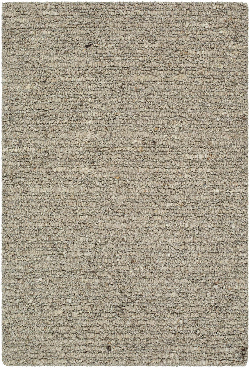 Close-up of the hand-tufted Winta Taupe Wool Area Rug, showing its textured wool design in gray, sage, and tan. Design-Rectangle-23