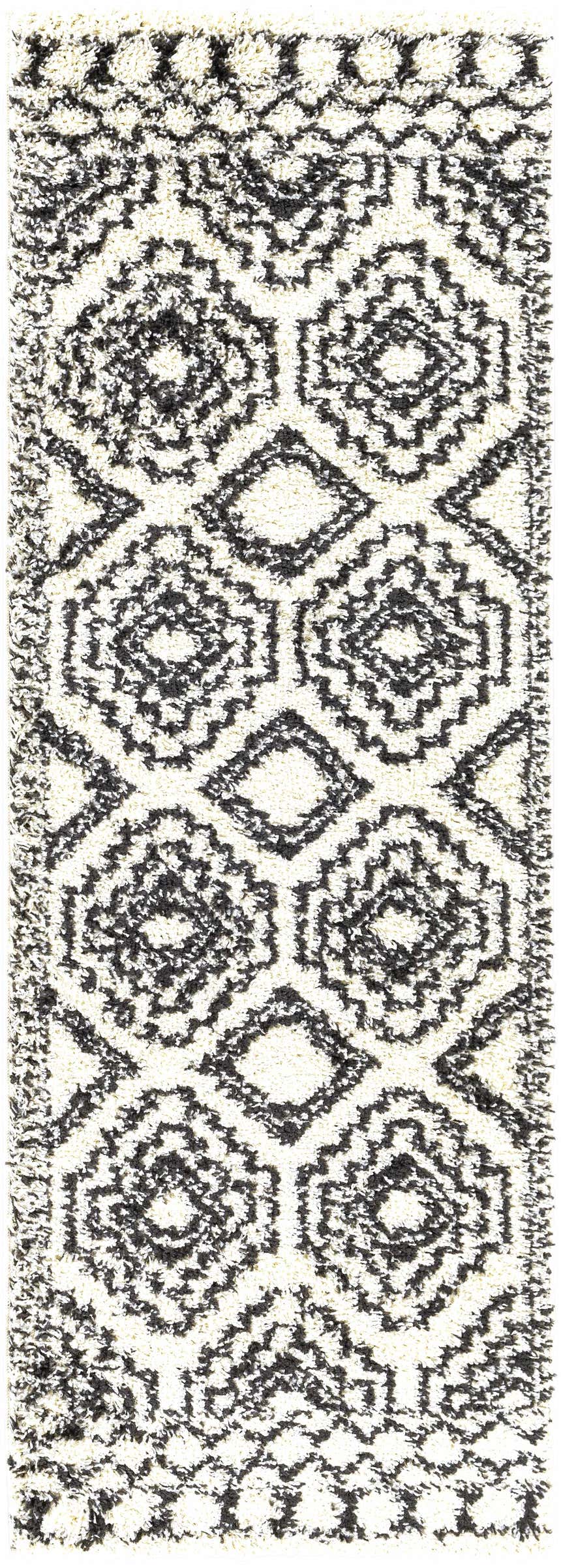 Close-up of the Lloydminster Area Rug. Black geometric Moroccan design on a cream shag pile. Design-Runner-2773