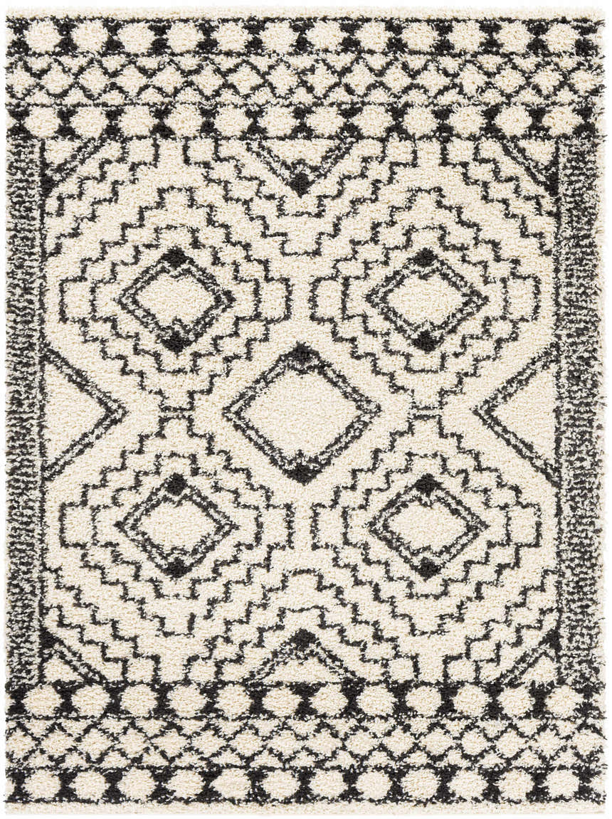 Close-up of the Lloydminster Area Rug. Black and cream shag rug with a geometric Moroccan-inspired pattern. Design-Rectangle-537