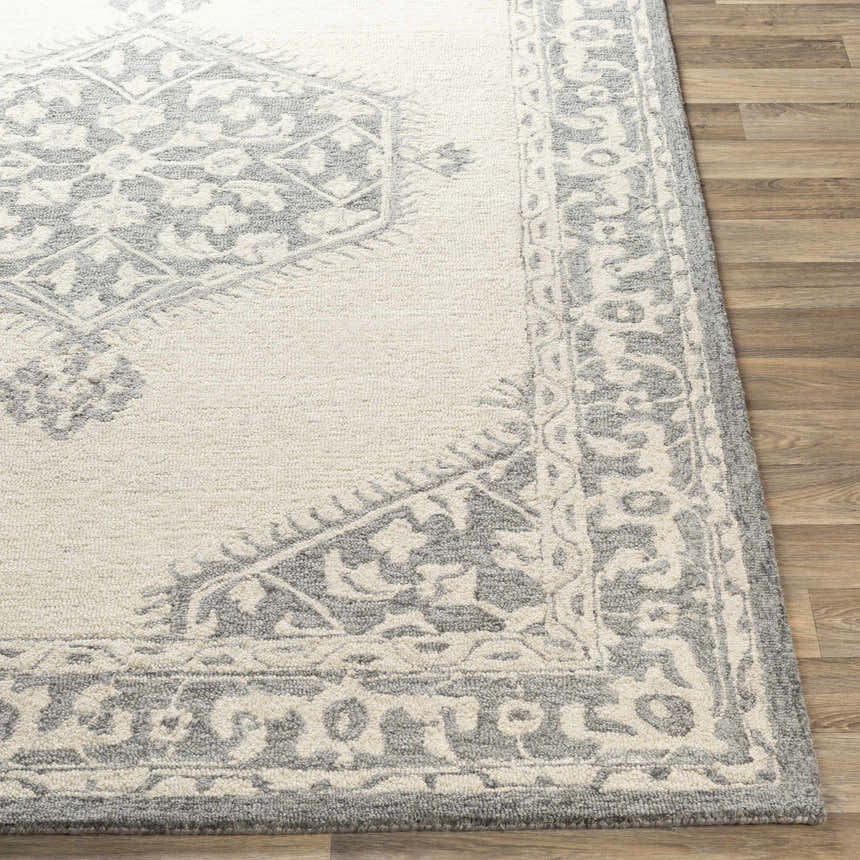 Close-up of the hand-tufted Longton Area Rug. Charcoal and gray traditional pattern on a wool runner rug. Front