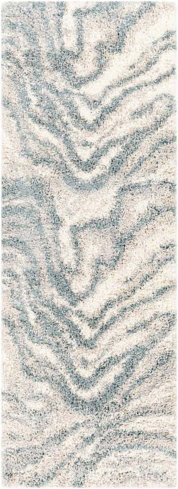Close up of the Lottery Area Rug. Shag rug with a blue, cream, and light beige wavy pattern. Design-Runner-2773