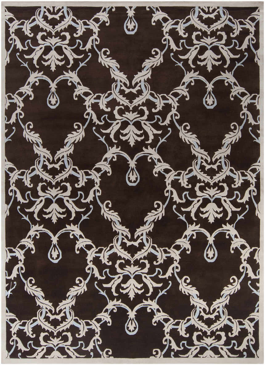Close-up of the Ludlam Area Carpet featuring a silver blue and light gray floral damask pattern on a dark gray wool rug. Design-Rectangle-811