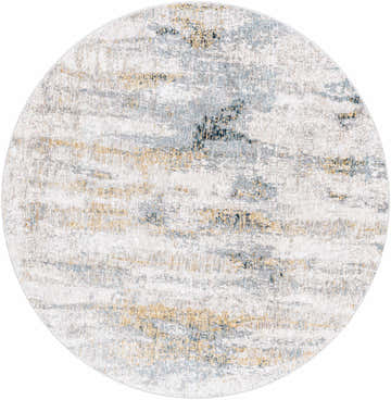 Close-up of round Lurnea Luxe Fringe Rug. Abstract design in light blue, dark blue, mustard, and gray hues. Design-Round-53