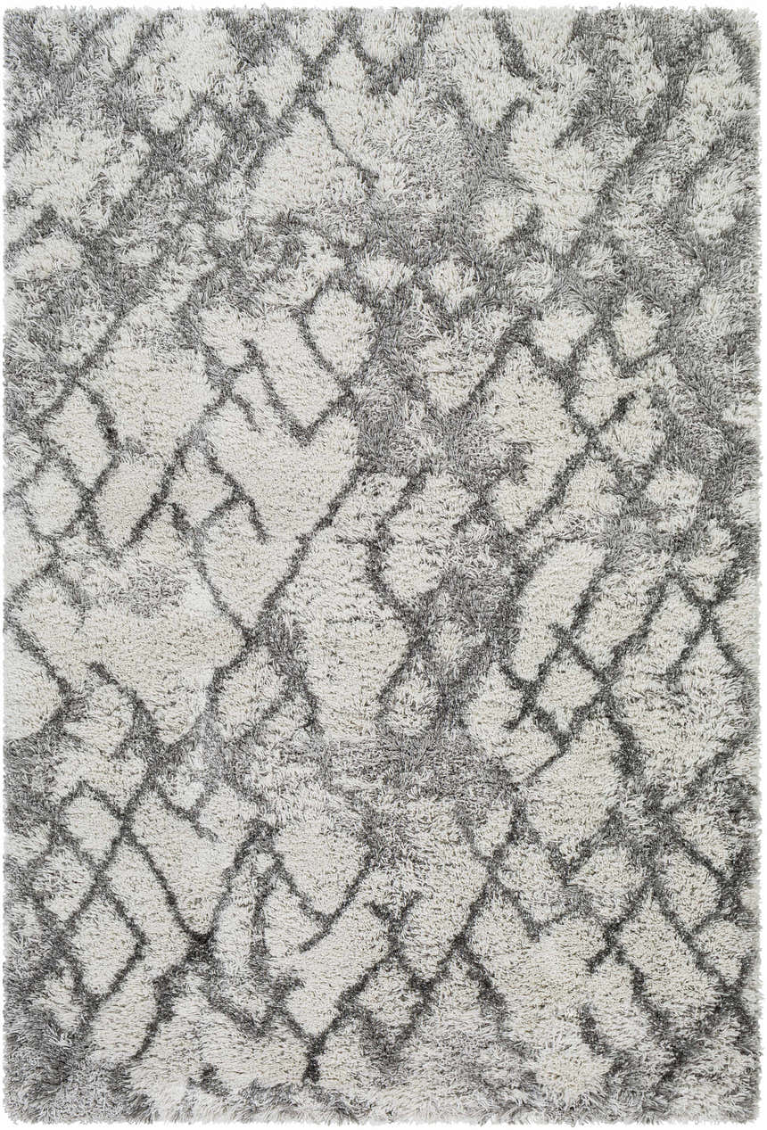 Close-up of the Lowesville Area Rug, a shag rug with a gray geometric pattern on an off-white background. Design-Rectangle-537