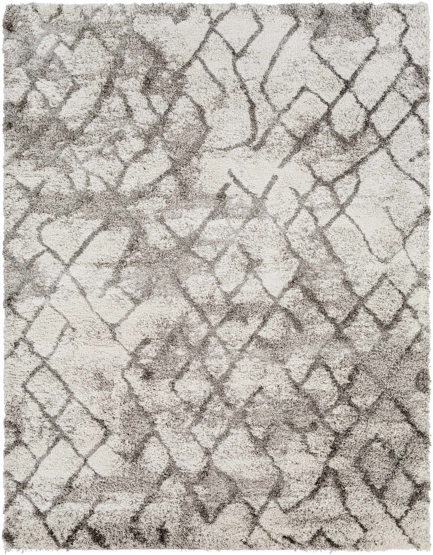 Close-up of the Lowesville Area Rug. Shag rug in gray and off-white with a contemporary geometric pattern. Design-Rectangle-71010
