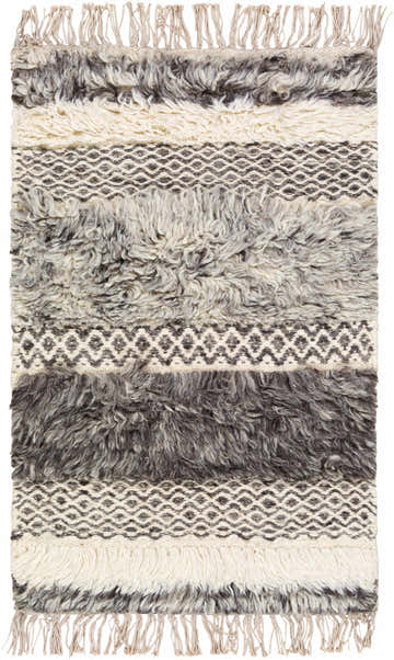 Close-up of the hand woven Elizabeth Area Rug. Features beige, dark brown, gray, and taupe stripes and diamond patterns. Design-Rectangle-23