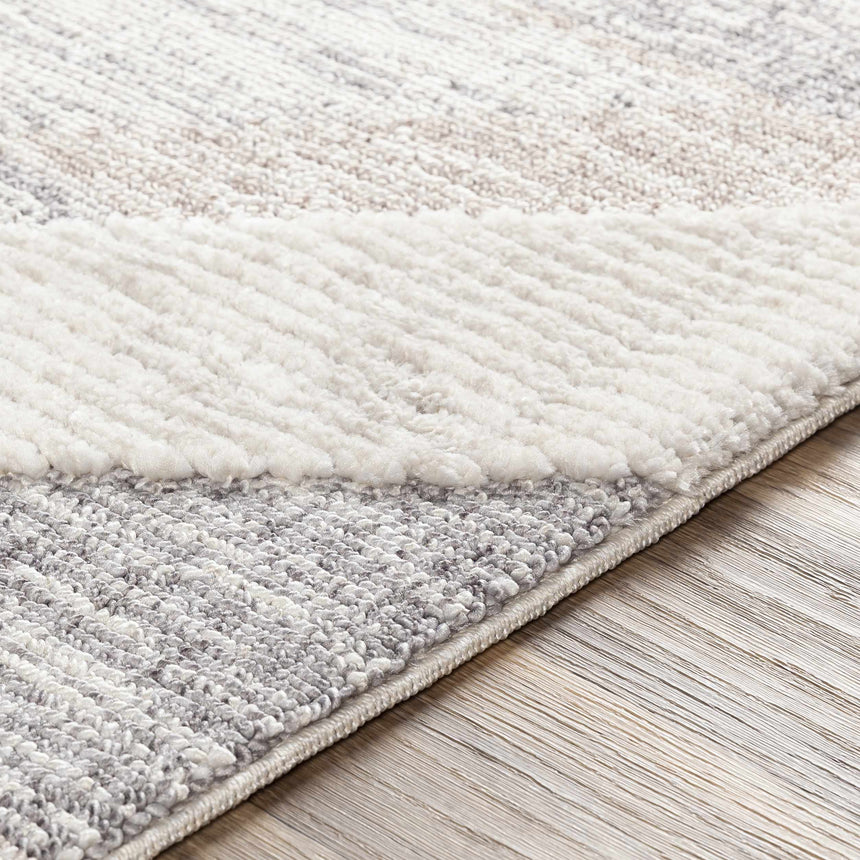 Magazine Geometric High/Low Pile Rug with Tassels - Clearance