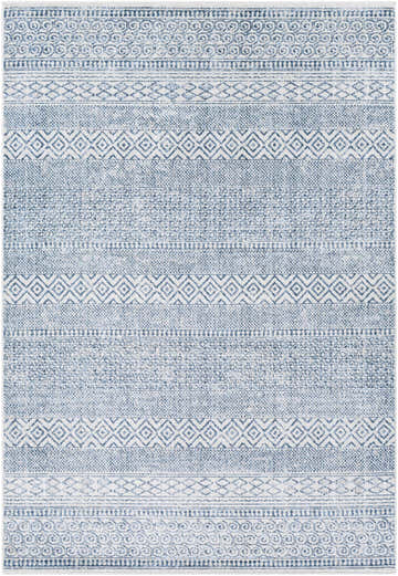 Close-up of the Malkara Area Rug. Cream rug with denim and pale blue bohemian-style geometric patterns. Design-Rectangle-537