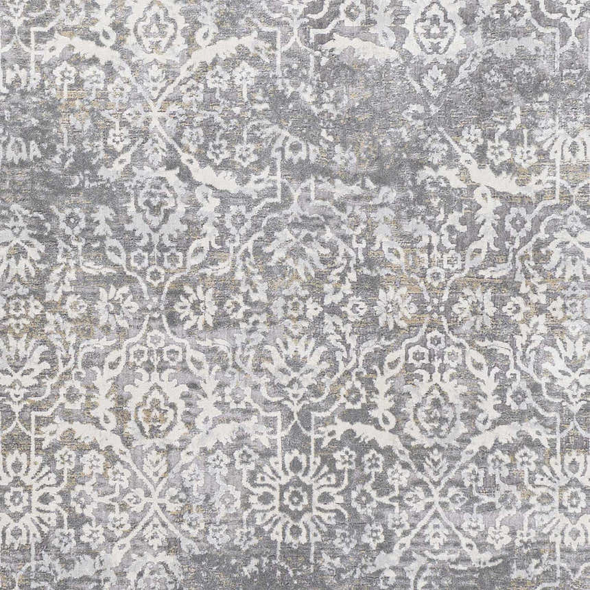 Close-up of the Mandurah Area Rug. Charcoal gray rug with cream and light beige traditional floral pattern. Swatch