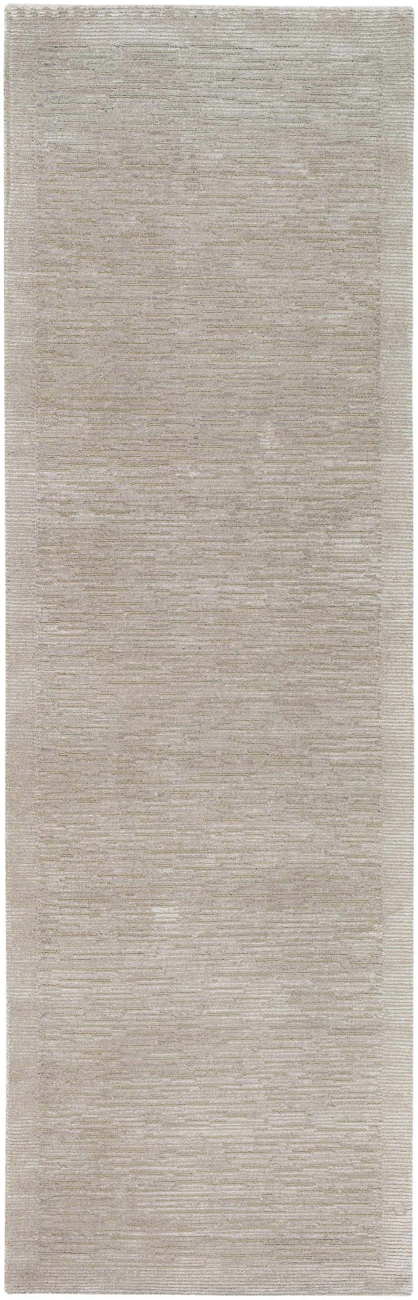Close-up of the hand-knotted Mardi Area Rug. Light beige rug with charcoal accents. Contemporary style, wool and silk blend. Design-Runner-268