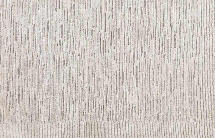 Close-up of the hand-knotted Mardi Area Rug. Charcoal and light beige wool and silk with a subtle vertical stripe design. Swatch