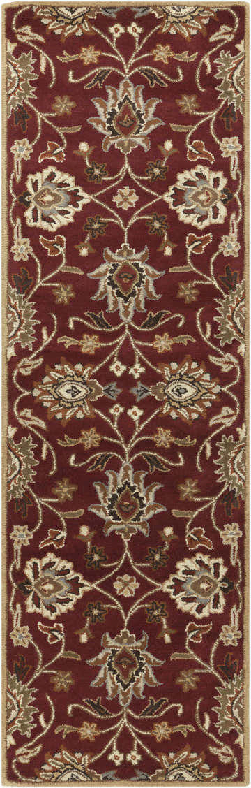 Close-up of the Conesus Red 1061 Rug. Hand-tufted wool rug with a traditional floral pattern in red, brown, and tan. Design-Runner-268