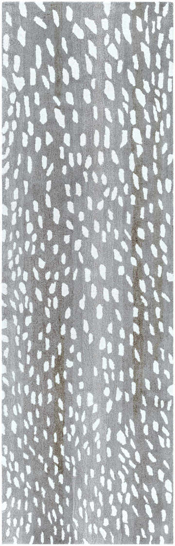 Close-up of the Athena Gray Giraffe Print Wool Rug, featuring a cream and gray animal pattern and hand-tufted texture. Design-Runner-268