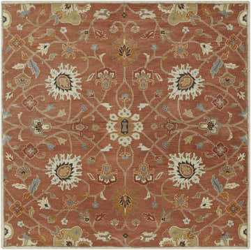 Close-up of the Logville Hand Tufted Rust 1119 Wool Rug. Features a floral pattern in rust, ivory, and blue tones. Design-Square-8