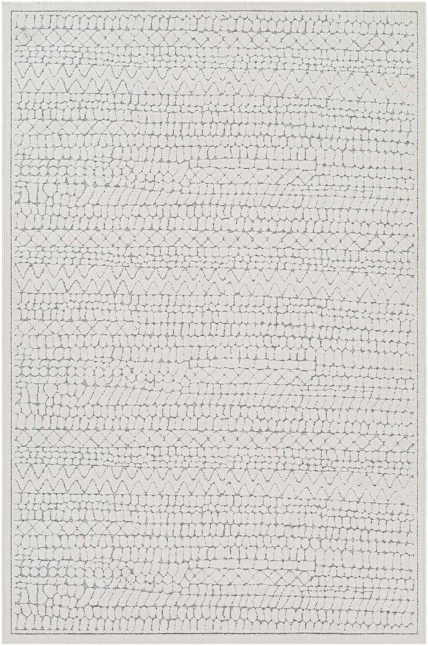 Close-up of the Middlefield Outdoor Rug. Machine woven rug with a charcoal and peach geometric pattern. Design-Rectangle-5373