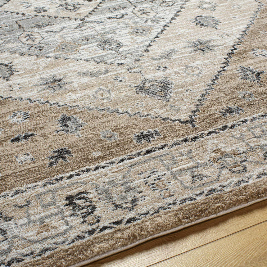 Close up of Minal Luxe Thick Area Rug showing dark gray and medium gray traditional pattern and soft texture. Texture