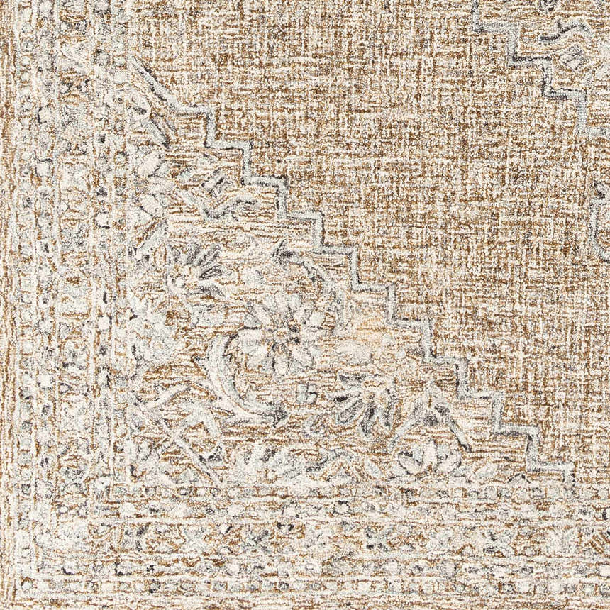 Close-up of the hand-tufted Modimolle Area Carpet. Features a traditional Persian design in brown, camel, and cream tones. Swatch
