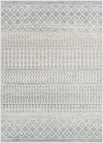 Close-up of the Morey Area Rug, a light gray farmhouse style rug with a geometric pattern. Design-Rectangle-5376
