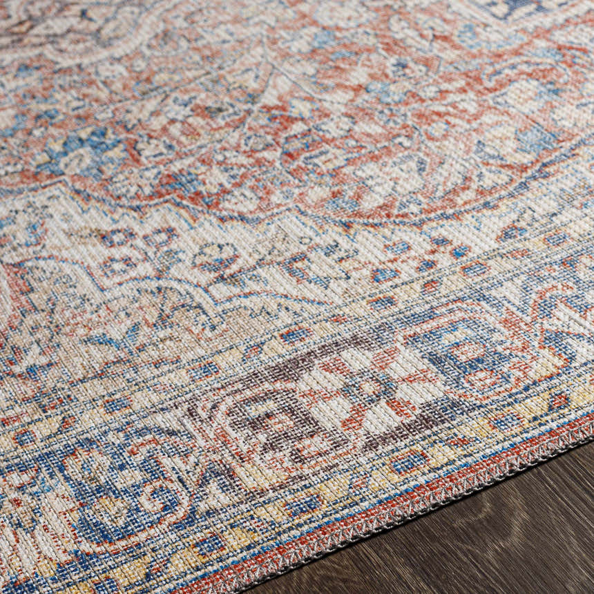 Close-up of the Cream Rust Maribojoc Medallion Washable Area Rug, showing the oriental pattern and texture. Texture