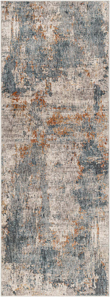 Close-up of the Andreas Luxe Fringe Rug; abstract design in brick red, dark blue, gray, and cream. Design-Runner-2773