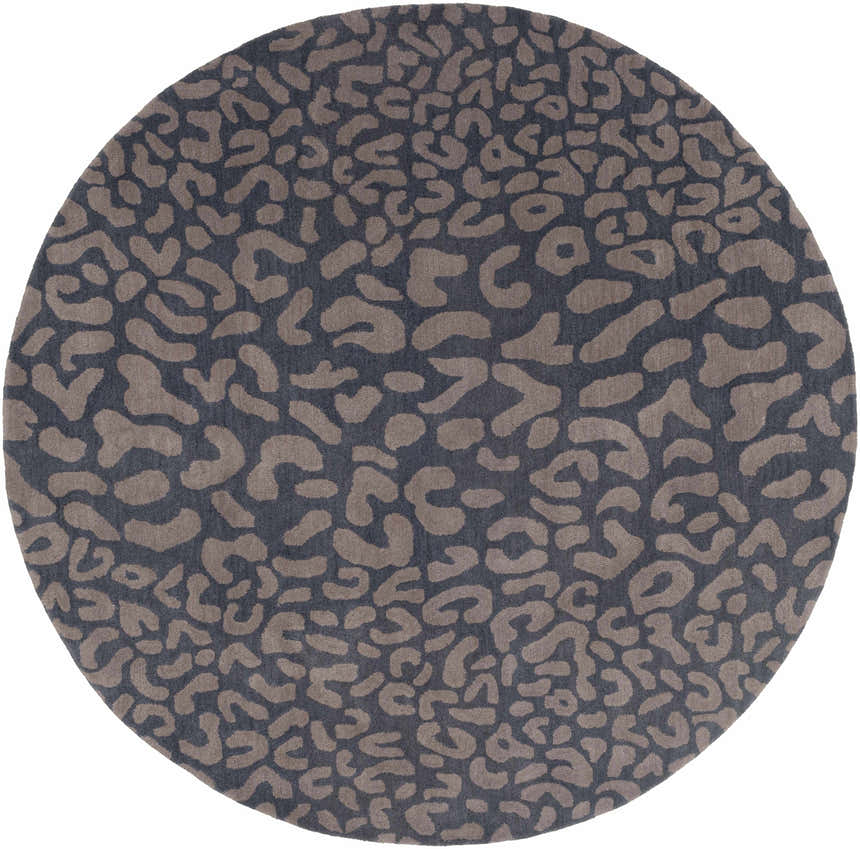Close-up of a round Neoma Animal Print Wool Rug. Gray background with a tan animal print pattern. Hand-tufted texture. Design-Round-8