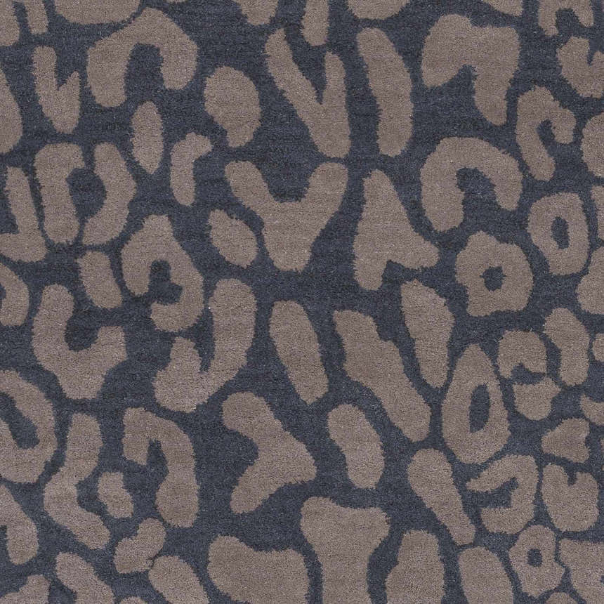 Close-up of the Neoma Animal Print Wool Rug; gray background with a brown leopard spot pattern. Swatch