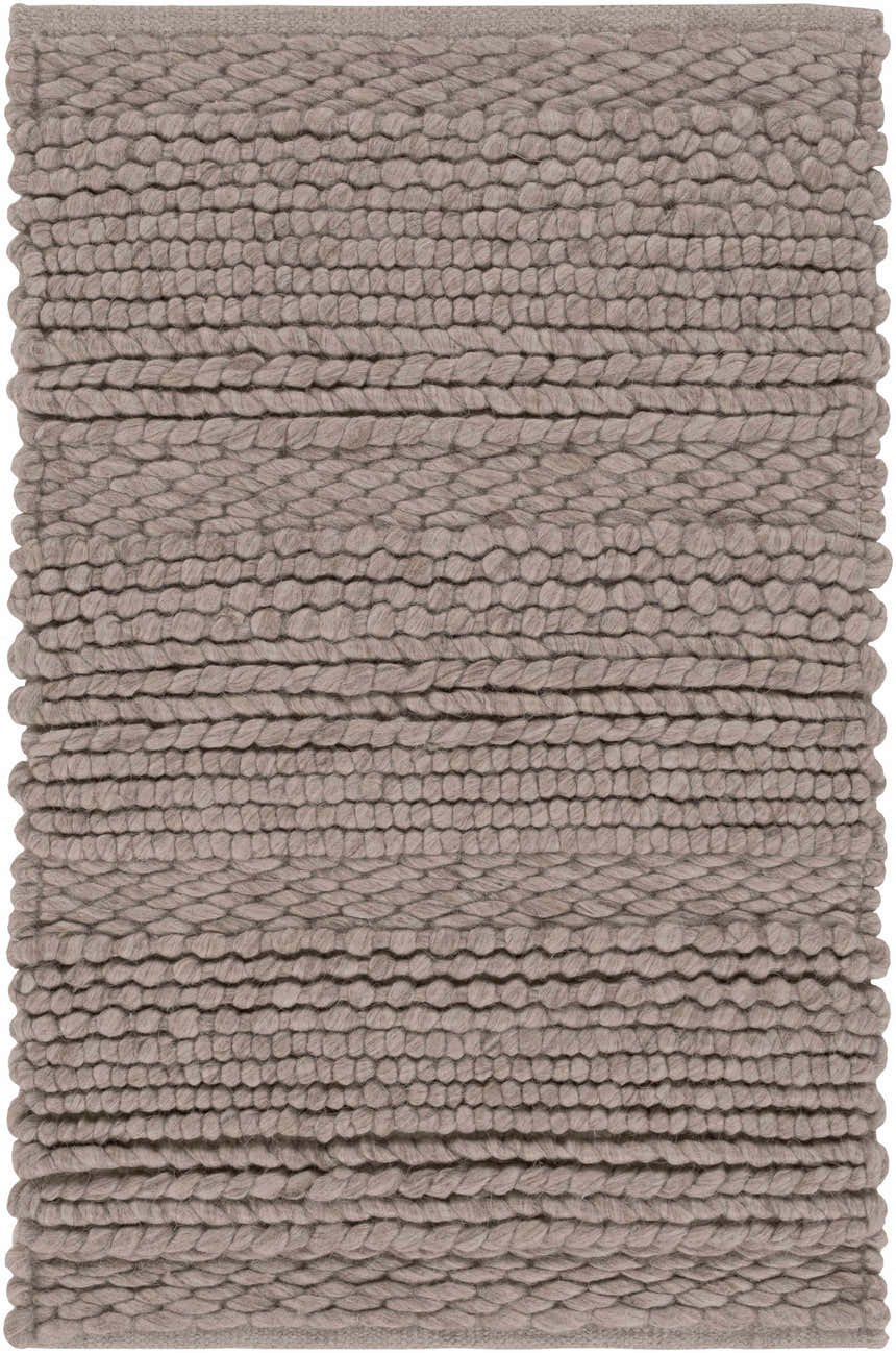 Close-up of the Newfolden Area Carpet showing its hand-woven, textured wool design in brown and ivory. Design-Rectangle-23