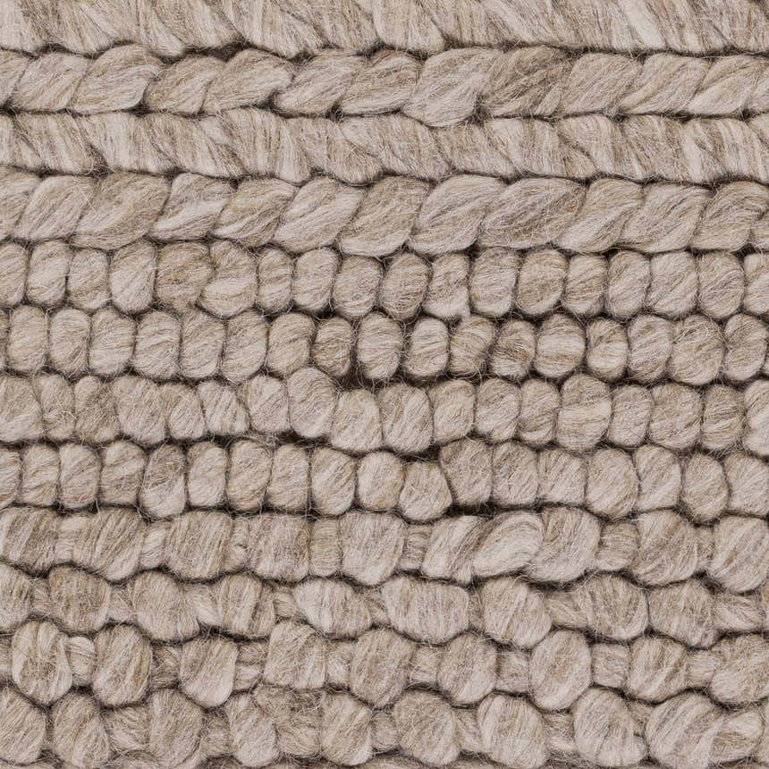 Close-up of the hand woven Newfolden Area Carpet. Brown and ivory wool with a textured, looped design. Swatch