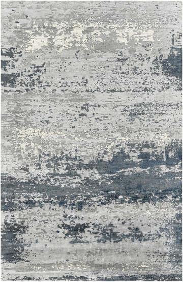 Close-up of the Okemos Area Rug. Contemporary design in charcoal, dark blue, gray, and beige. Hand-knotted viscose texture. Design-Rectangle-69